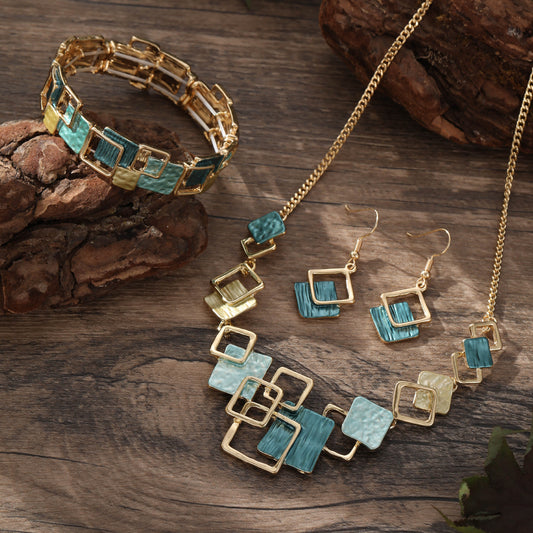 Parure géométrique colorée – Collier, bracelet & boucles d’oreilles style peinture à l’huile (Copie)